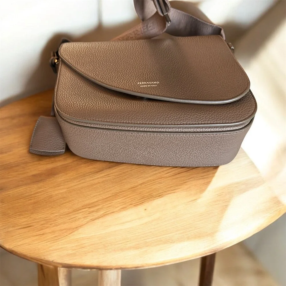 Salvatore Ferragamo Fiamma‎ Crossbody Bag in tan pebbled leather